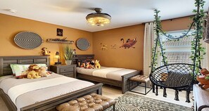 Kids will love the upstairs bedroom with a cool theme