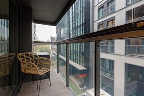 Private balcony fitted with garden furniture guests can relax.