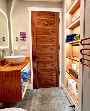 A place for everything and earthing in its place! Including the towel warmer.