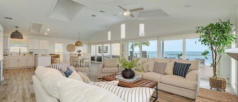 A spacious and airy living room awaits you at your next tropical vacation home