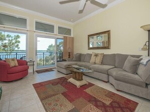 Living Room with New Sofa at 1898 Beachside Tennis