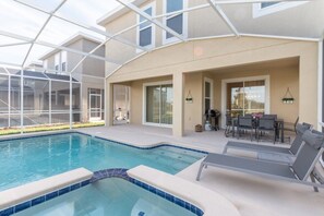 Private pool area, launge chairs and patio furniture