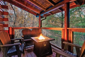 Sit by the outside fire table and enjoy the mountain air.