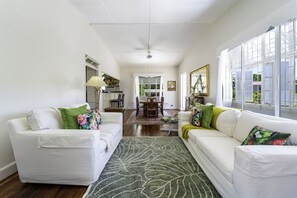 Chat or watch TV in this bright, airy living room.