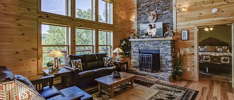 Gas fireplace, Mission Style furniture, and gorgeous mountain views