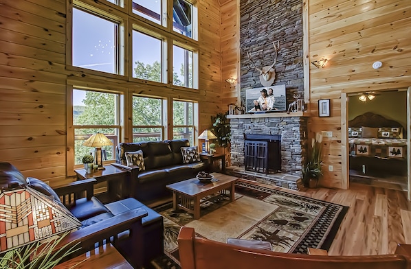 Gas fireplace, Mission Style furniture, and gorgeous mountain views