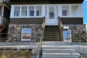 Front of home with an 8 ft x 30 ft porch, all across the front of the home.  