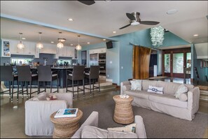 Kitchen and entry from living room - new larger couch now