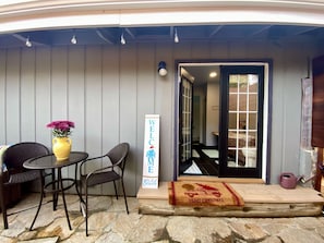 Cute little patio with smart door lock access