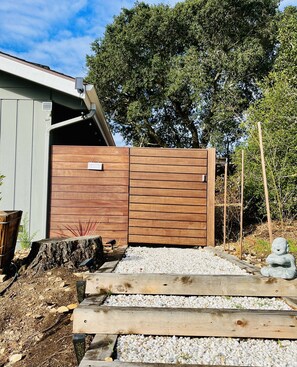 Enter your retreat through the fence gate. Theres fence gate lock as well