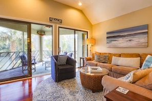 Let's Do Sunset has a fabulous screened porch off of the living room & master suite.