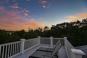 Kick back and enjoy a Charleston sunset on our roof deck!