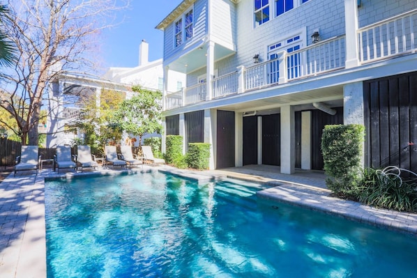 Deja Blue has a private pool and patio in its backyard.