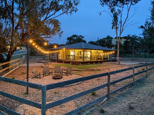 Directly opposite the boat ramp with views of the river from every window. 