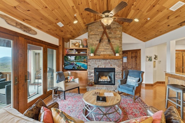 Living Room--- Cozy Fireplace and TV