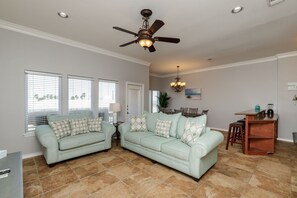 Spacious living area with updated furnishings and fixtures