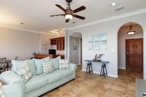 Living, dining and wet bar area to spend time with the family