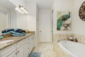 Get that spa feeling at this primary bathroom
