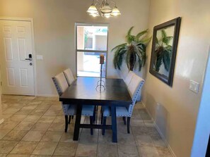 Table seats 4. Leaf and  2 additional chairs can be provided upon request.