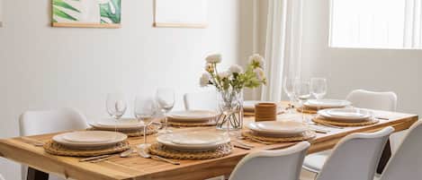 Dining table can accommodate up to 8 guests. We provide everything needed to set a beautiful dinner