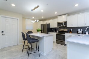 Fully equipped kitchen area.