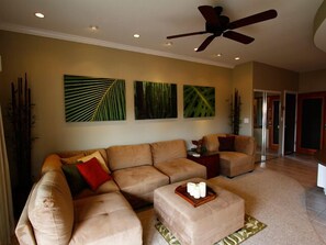 Comfortable living area with ceiling fans