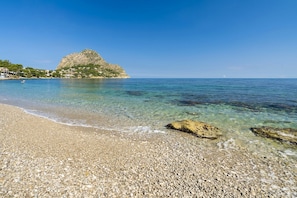 The beach right below the house