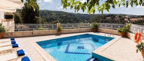 Sophisticated pool surroundings offering a sense of tranquility.