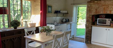 Kitchenette opens onto garden