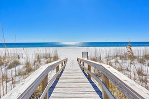 Walkway across the dunes to the powdery white sands of Orange Beach