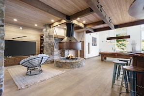 Copper Wood Burning Fireplace and Big Screen TV