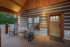 The front porch welcomes you with rocking chairs!