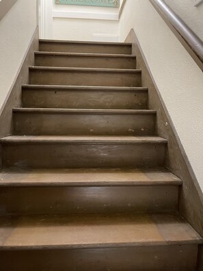 Stair going upstairs 2nd door to going  in the apartment