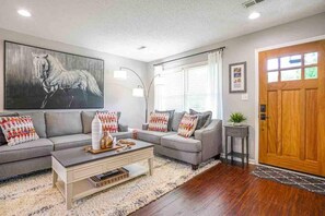 Family Room. Solid wood exterior craftsman door. 