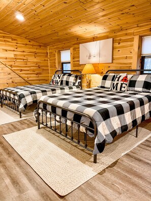 Two queen beds in loft area 