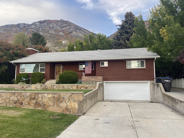 Exterior of our home. Basement entrance is adjacent to the garage door