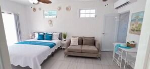 1st Floor 1st Master bedroom with king bed, Smart TV,  and private bathroom