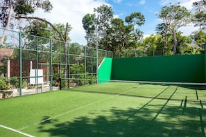 Shared paddle tennis court within the private neighborhood "La Privada."