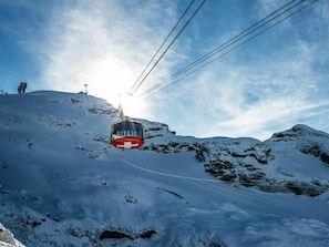 Cloud, Sky, Snow, Mountain, Slope, Cable Car, Highland, Electricity, Freezing, Terrain