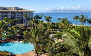 Looking over a pool and some of the grounds to the ocean & the Island of Lana'i.