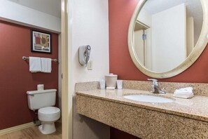 Full bathroom with a shower. Basic toiletries and towels are provided