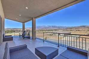 Covered Balcony | Outdoor Seating Area | Red Cliffs Views