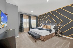 Stylish, spacious primary suite with king bed