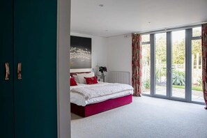 Downstairs bedroom w Super King bed from which you can immediately step out into the garden