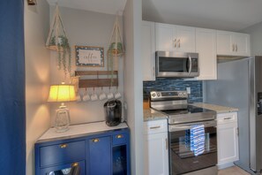 Kitchen is well-equipped to make preparing meals or snacks a breeze.