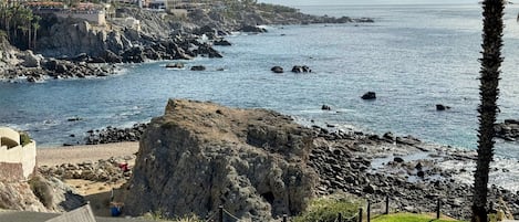 View from the patio. Our sand beach swim/snorkel cove is to the left