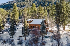 Nestled among the pines, our home sits beside Blue River with amazing views year-round.
| Blue River Hideaway by Boutiq Luxury Vacation Rentals | Breckenridge, Colorado