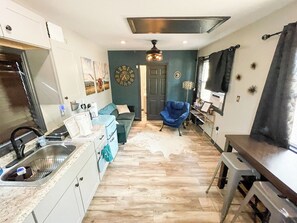 Seamlessly blending kitchen, living, and dining.