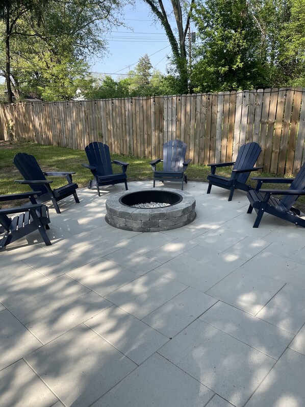New paver patio with built in fire pit. Plenty of space to entertain friends!