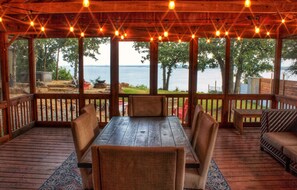 This screened in porch is perfect to be outside without having to be in nature.